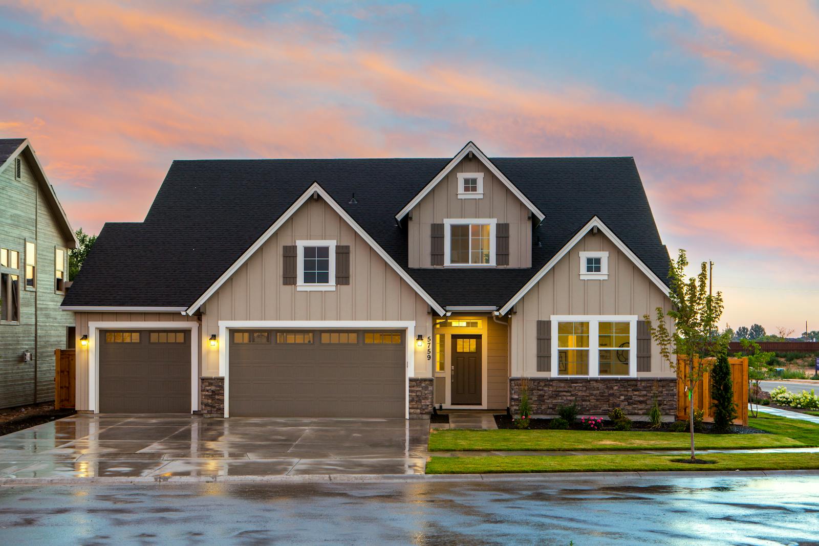 Home insurance, Charming family home in Boise, ID with a modern facade and spacious garage.